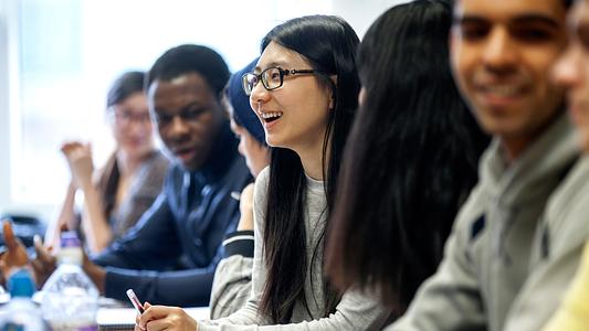 International student laughing 