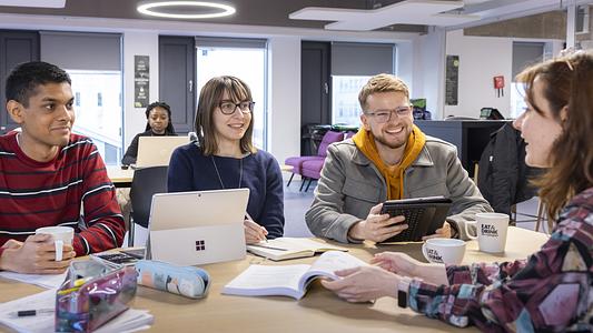 Charlie Eggs and students using new facilities in the Babbage Building.