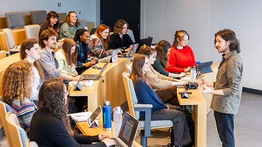 Postgraduate students in a lecture theatre.