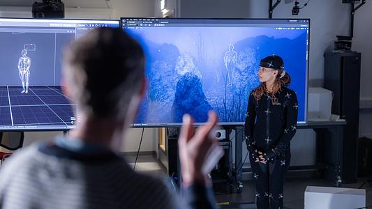 Acting student Shay Jones using the motion capture suite in the Immersive Media Laboratory.