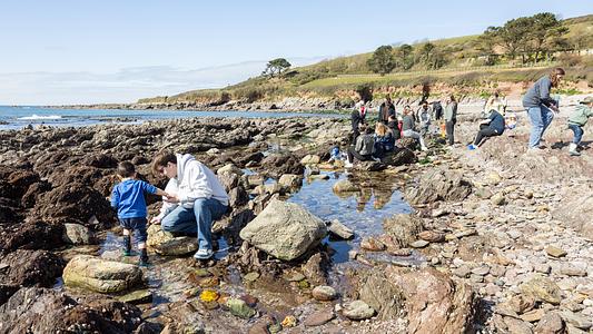 Students on Early Childhood Studies course at Wembury beach