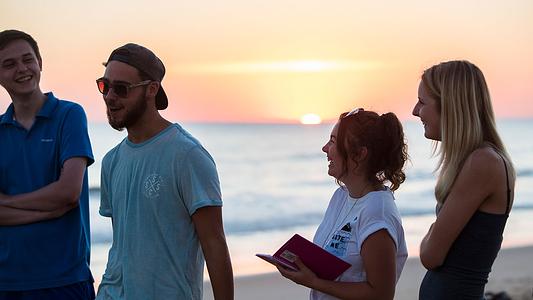 Student blogs. Students on the beach at sunset