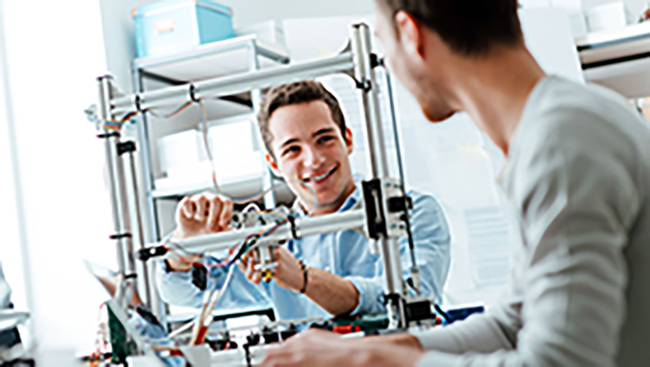 Engineering students working in the lab