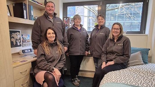 Halls Team in January 2025, sat in a group in a generic halls of residence room