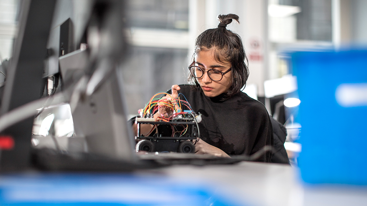 Student Ishita studying for her masters