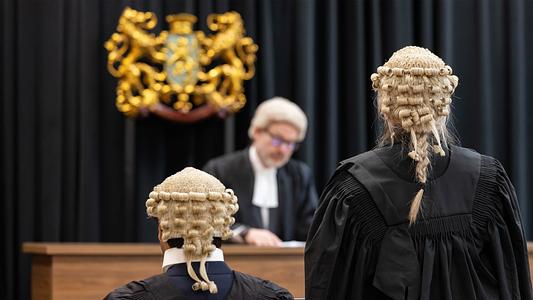 Law students practising in the moot court 