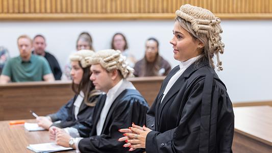 Students using Moot Court in the Foulston Room (full-bleed version)